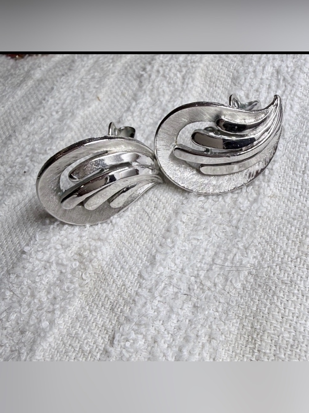 Vintage Crown Trifari silver tone clip-on earrings Women’s costume jewelry